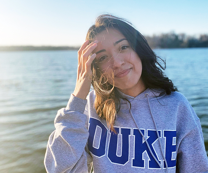 Young woman wearing a Duke sweatshirt
